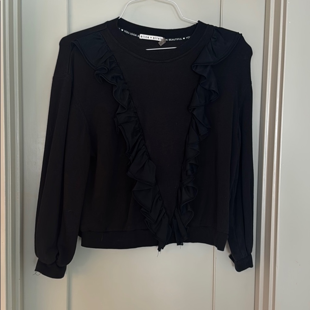 Black sweatshirt with ruffle